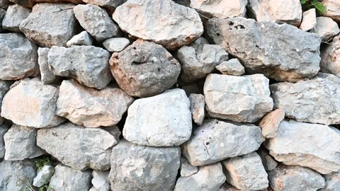 Dry stone wall, close up. Medieval stone wall pattern. Stock Footage 155587253