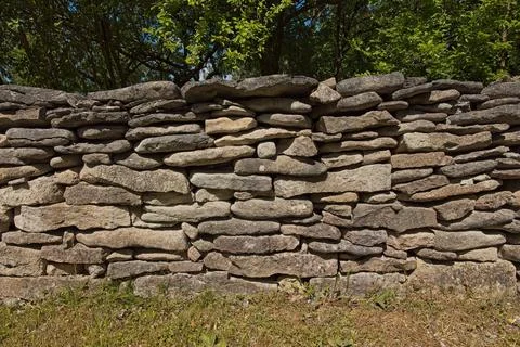 Dry stone wall. Stock Photos