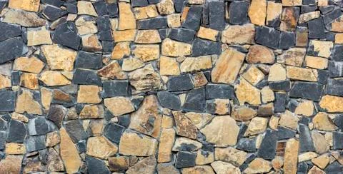 Dry stone wall texture background Stock Photos