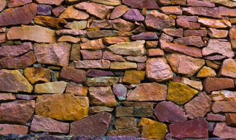 Dry stone wall texture background Stock Photos