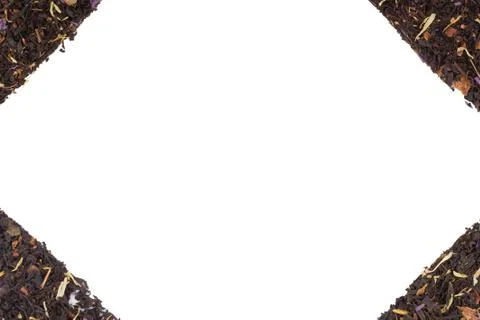 Dry tea leaf on an isolated background in the form of a frame Stock Photos