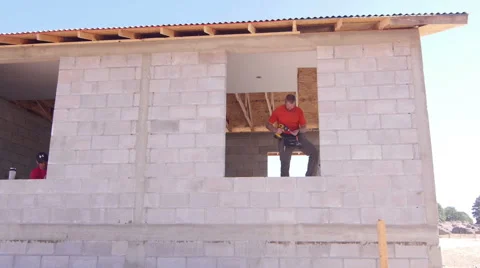 Dry waller at a construction site Video stock 40367829