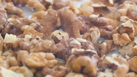 Dry walnut background, close up nut, rotation. Food background. Stock-Footage 253112014