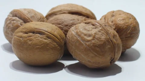 Dry walnuts on white background Stock Footage 138037200