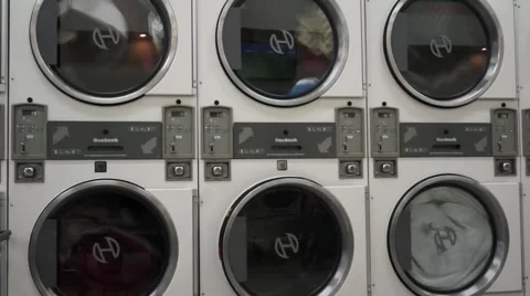 Dryer machines in a laundrymat Stock Footage 53789791