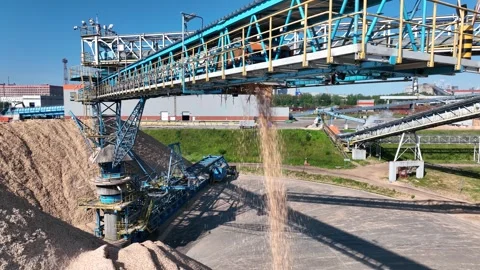 Drying and storage of wood chips in piles. General view of the paper mill Stock Footage 321667966