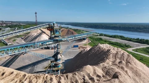 Drying and storage of wood chips in piles. General view of the paper mill Stock Footage 321668900