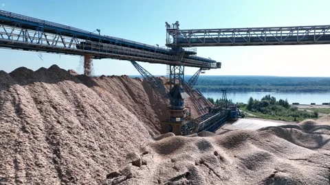 Drying and storage of wood chips in piles. General view of the paper mill Stock Footage 321669602