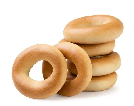 Drying bagels close-up on white. Isolated Stock Photos