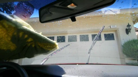 Drying car's windshield Stock Footage 493099