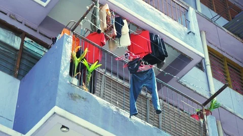 Drying clothes on the balcony in the center of Kuala Lumpur Stock Footage 94589964
