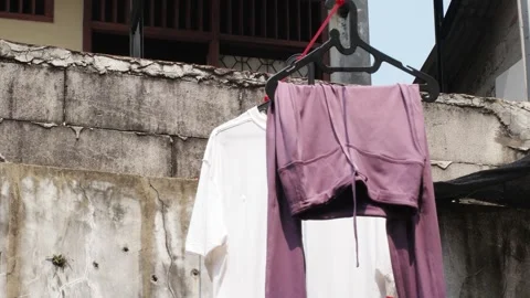 Drying clothes during the day Stock Footage 335121705