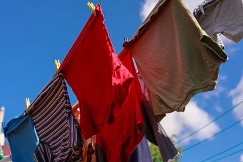 Drying clothes outdoors. Stock Photos