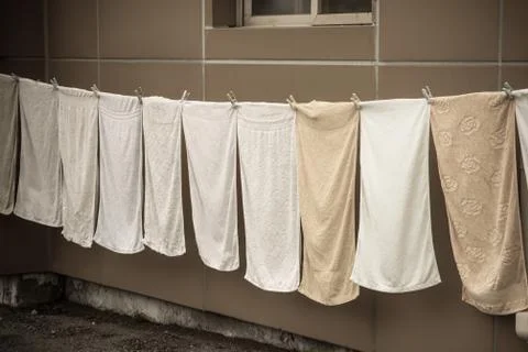 Drying clothes on a rope. Stock Photos