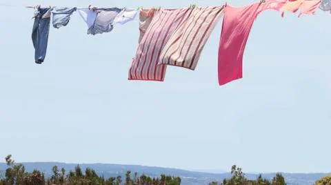 Drying clothes on a rope. Stock Photos