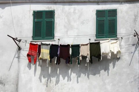 Drying clothes on the wall Stock Photos