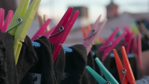 Drying clothes in the wind with clothespins on a rooftop terrace Stock Footage 124647227