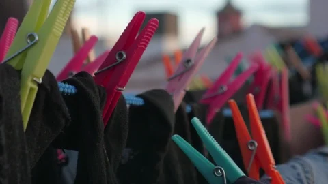 Drying clothes in the wind with clothespins on a rooftop terrace Stock Footage 124651323