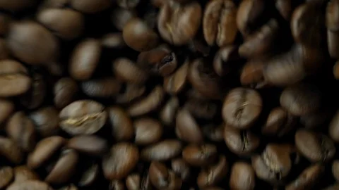 Drying coffee beans after roasting, extreme close-up, roaster Stock Footage 129400952