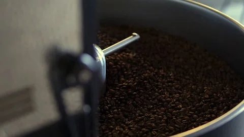 Drying, coffee beans after roasting, close-up, roaster, side view Stock Footage 129782781