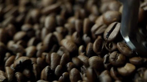Drying coffee beans, close-up, wavy move, roaster Stock Footage 129401003