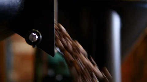 Drying coffee beans, pour in the packer, juicy close-up Stock Footage 129400837