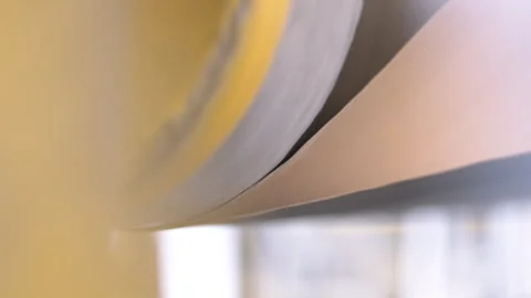 Drying cylinder rotates paper to remove moisture in workshop 動画素材 294201785