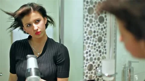 Drying a hair Stock Footage 24668770