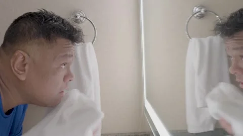 Drying Hair In Front of Mirror Stock Footage 320974228