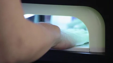 Drying Hands in UV Light Gel Machine Video stock 76568984
