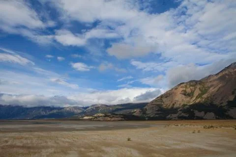 Drying Kluane Lake with clouds Stock Photos
