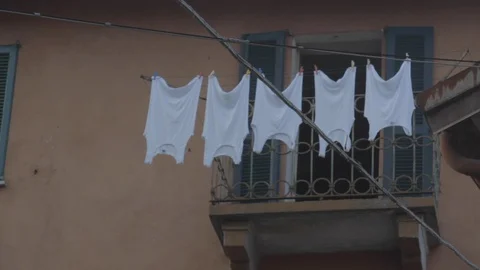 Drying laundry on the balcony at lake Como Stock Footage