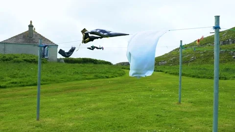 Drying Laundry on the Line in the Backyard, Windy Day, Slow Motion, LOOP Stock Footage 156311774