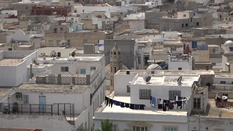 Drying laundry on rooftop of historic building in old medina of Sousse Tunisia Stock Footage 328632782