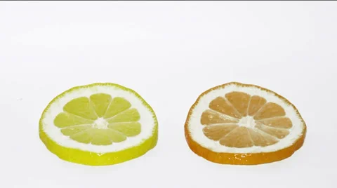 Drying  lemon and orange slice isolated on white Stock Footage 36677699