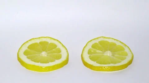 Drying  lemon slice isolated on white Stock Footage 36678371