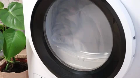 Drying machine in house for drying linen, clothes, bed linen. Dryer. Stock Footage 187812444