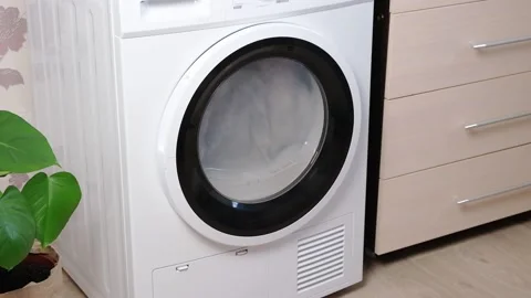 Drying machine in house for drying linen, clothes, bed linen. Dryer. Stock Footage 187812935