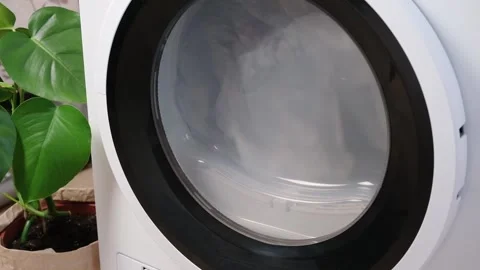 Drying machine in house for drying linen, clothes, bed linen. Dryer. Stock Footage 204876621