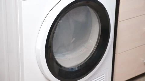 Drying machine in house for drying linen, clothes, bed linen. Dryer. Stock Footage 218631116