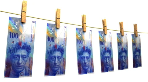 Drying Swiss Francs (Loop + Matte) Video stock 49183094