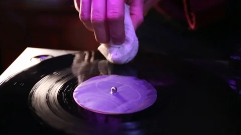 Drying vinyl record with a cloth after wet clean. Video stock 122598670