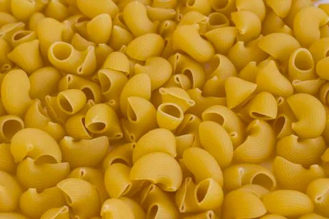 Dry,Uncooked Shape Pasta Background,top view,flat layout. Stock Photos