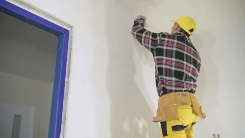 Drywall Ceiling Patching by Remodeling Worker Vídeos de archivo 154774811