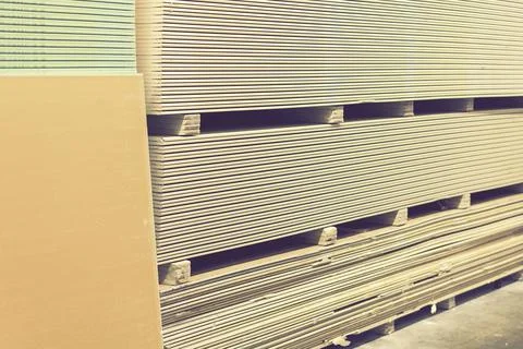 Drywall in a hardware store. Drywall sheets for repair and construction. Repa Stock Photos