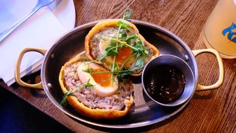 DSCF0982 Tasty breakfast with bread, egg and coffee on wooden table. Stock Photos