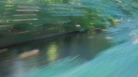 DSCF1444Abstract motion blur effect. River and forest in the summer time. Stock Photos