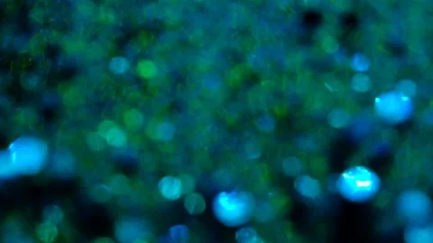 DSCF6852Blue glitter background in slow motion. Stock Footage 239416176