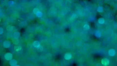 DSCF6857Blue glitter background in slow motion. Stock Footage 239416209