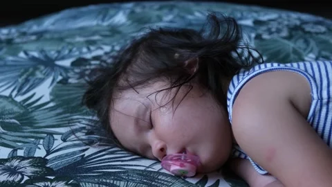DSCF7380 Luna Sleeping Pacifier Stock Footage 144594409